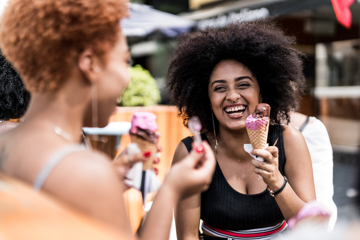 Girl Friends Eating Ice Cream