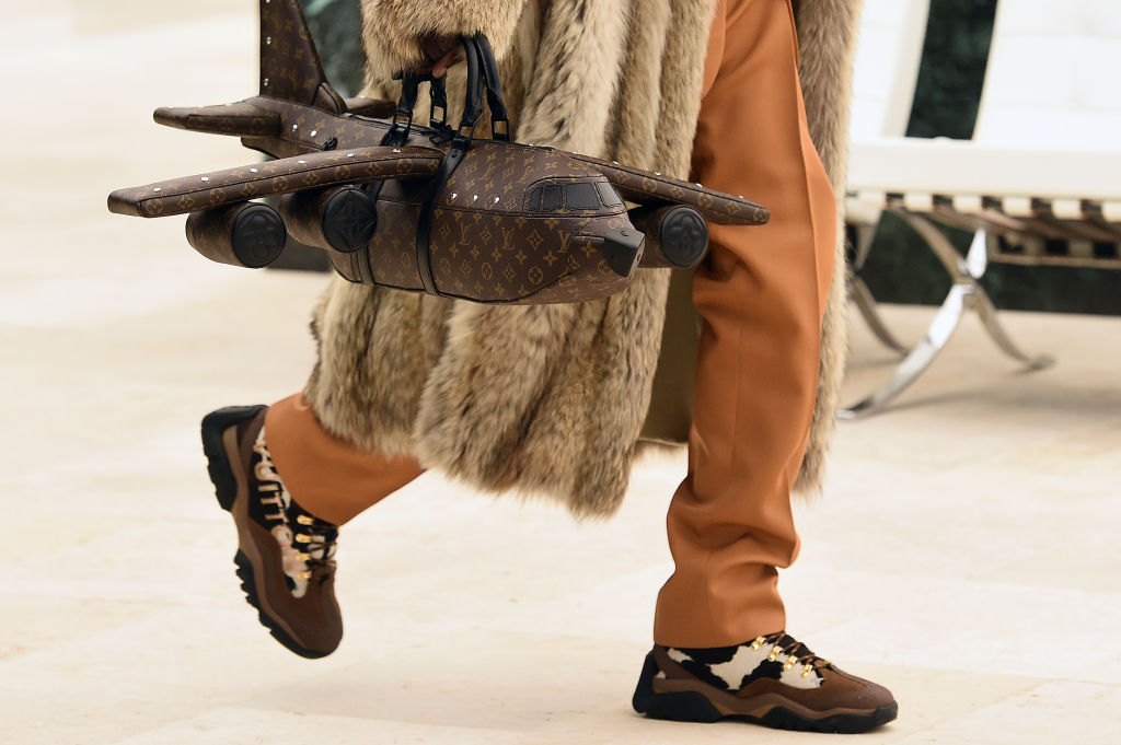 Chris Brown Shows Off $39,000 Louis Vuitton Airplane Bag