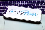 In this photo illustration, an OnlyFans logo seen displayed...