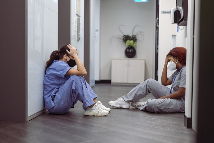 Exhausted nurses take a break from their stressful shift