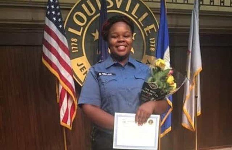 Breonna Taylor Smiles In Front Of A Louisville Department Agency