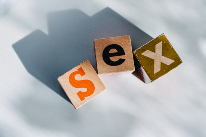The word 'sex' spelt out in blocks. Conceptual with space for copy.