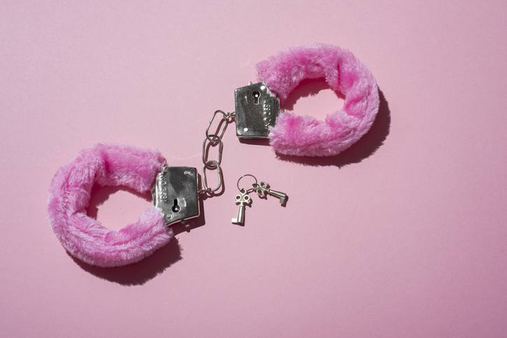 Pink locked handcuffs for adult games