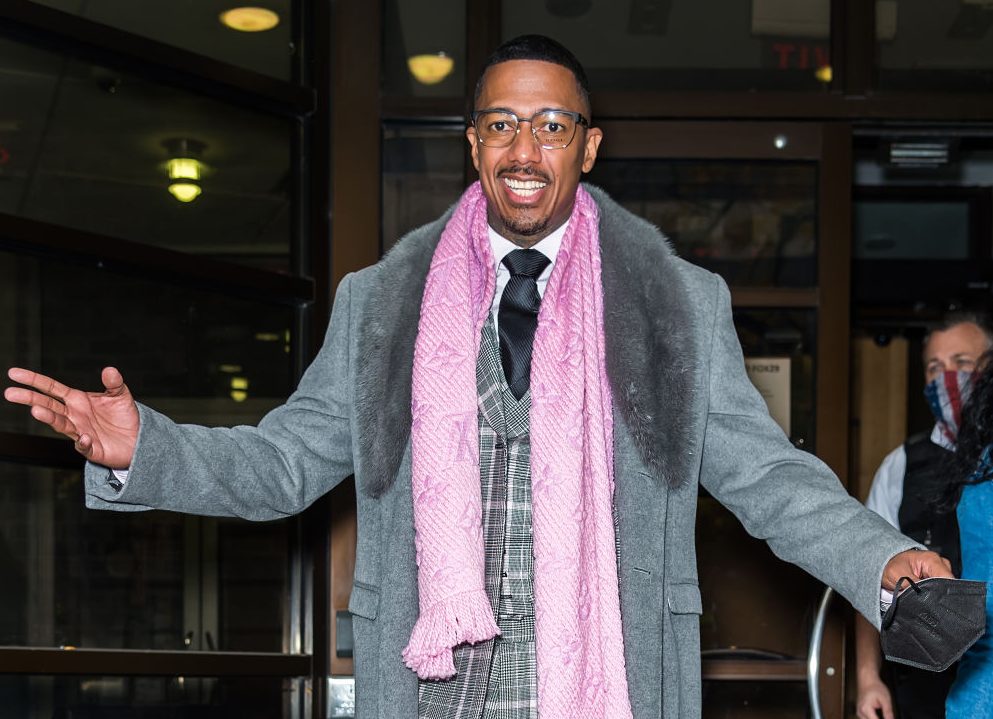 Nick Cannon wear a plaid suit in Philadelphia.