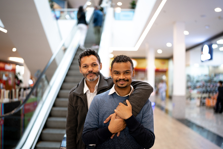 Portrait of homosexual couple at the mall