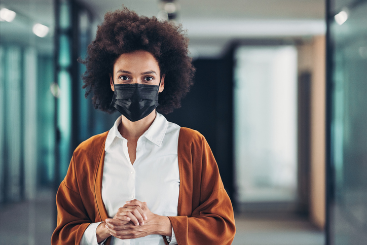 Portrait of a businesswoman with protective mask