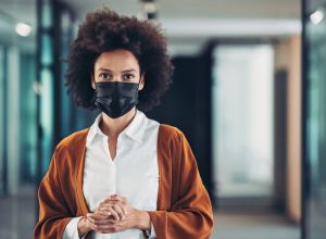 Portrait of a businesswoman with protective mask