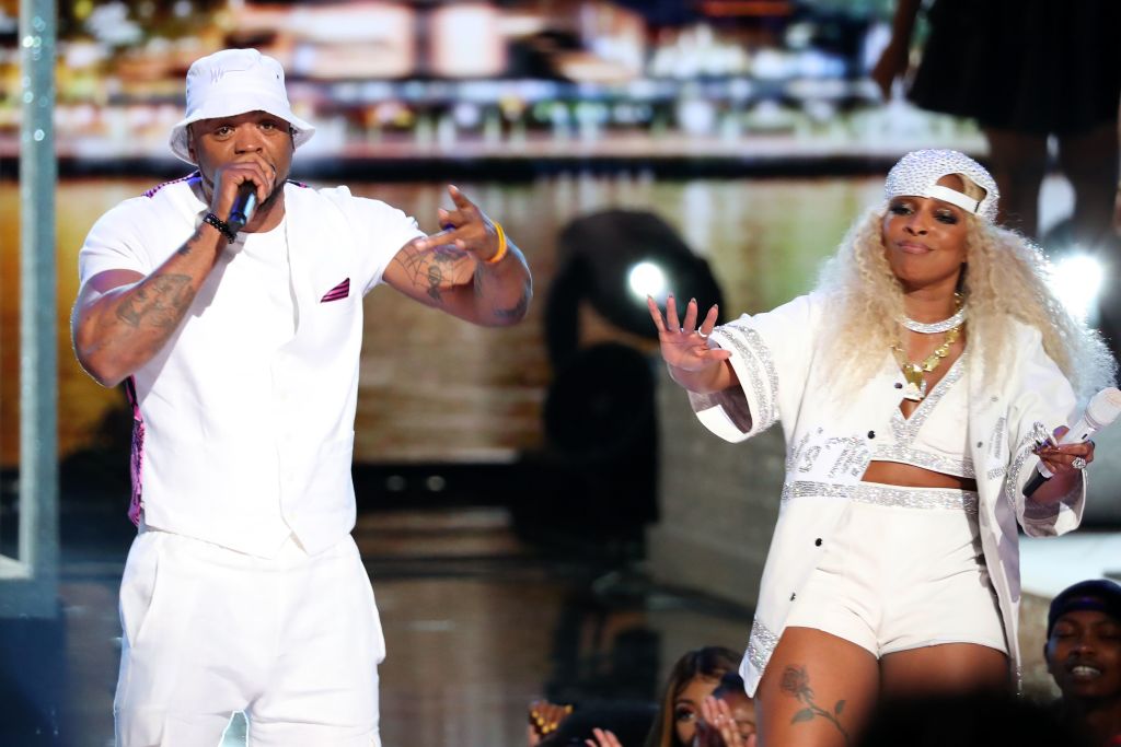 Mary J. Blige and Method Man perform onstage during the 2019 BET awards