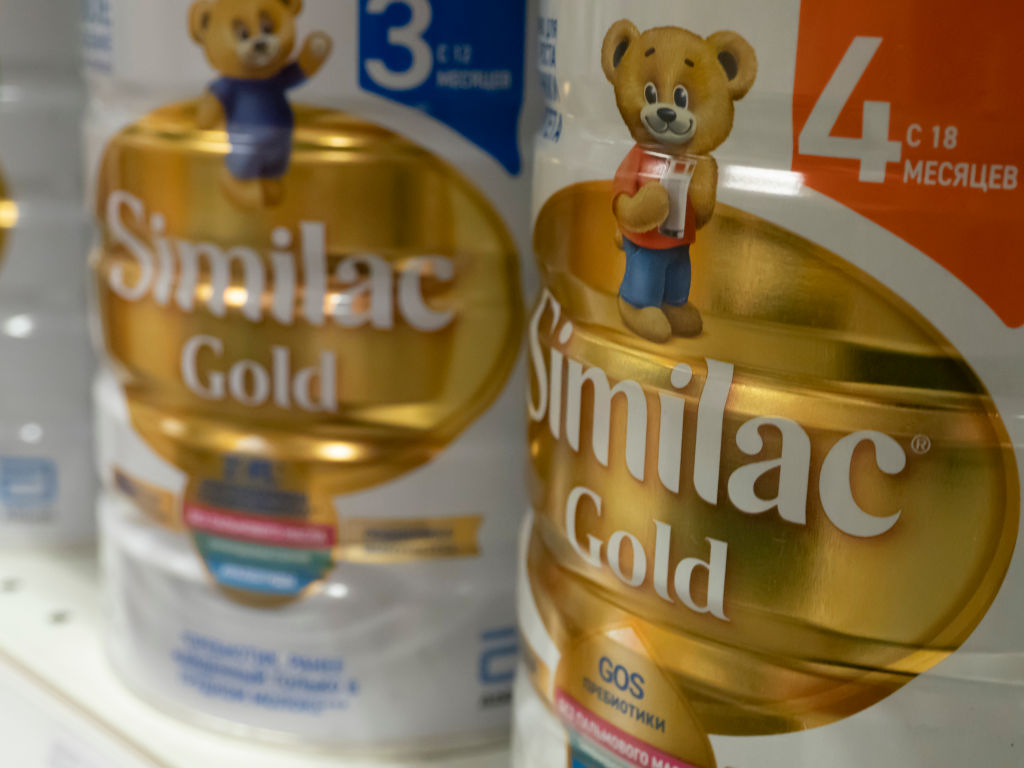 Powdered milk formula Similac Gold infant formula on a store...