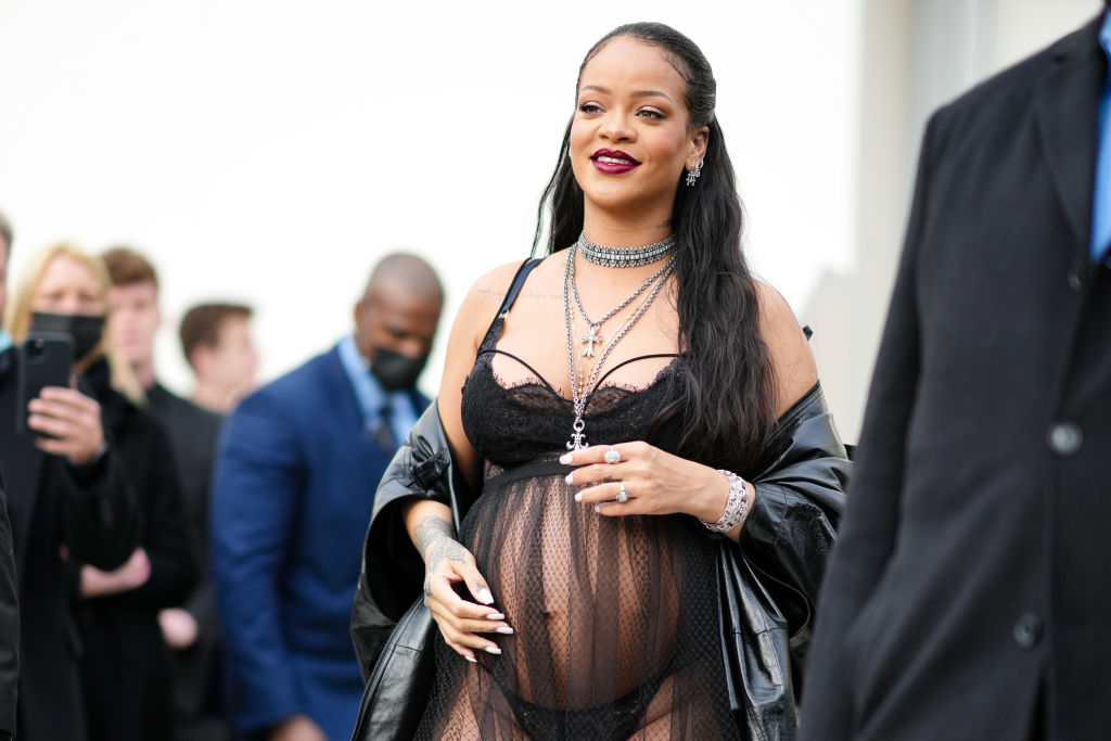 Rihanna Smiles Outside of the Dior Fashion show.