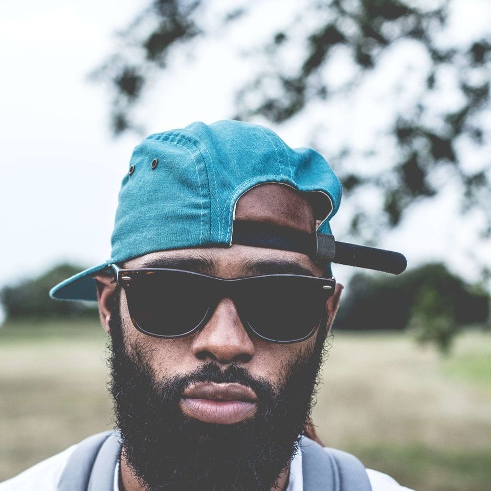 Black Bearded Man and Man with muscles