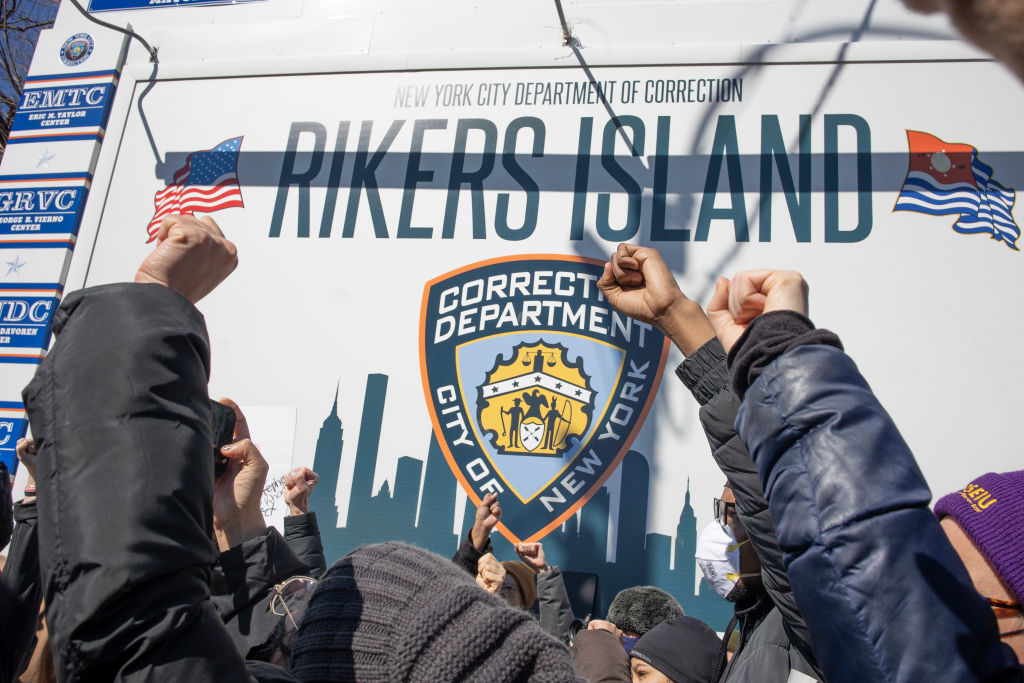 Criminal justice activists hold rally on Rikers Island