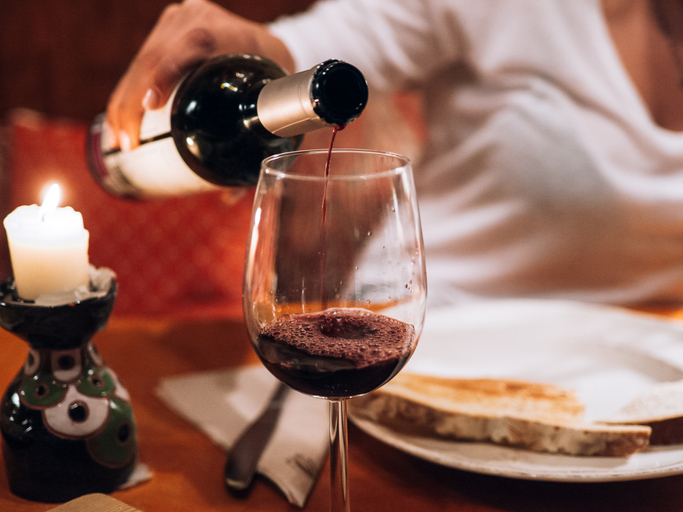 Woman serving wine