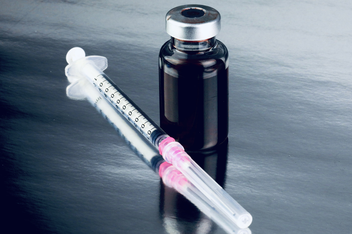 Syringe with hypodermic needle HIV vaccine trial