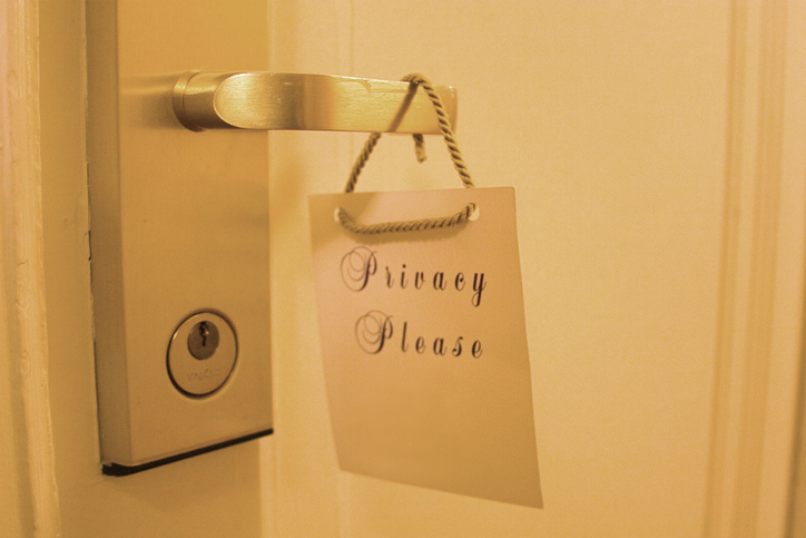 Hotel door handle with privacy sign