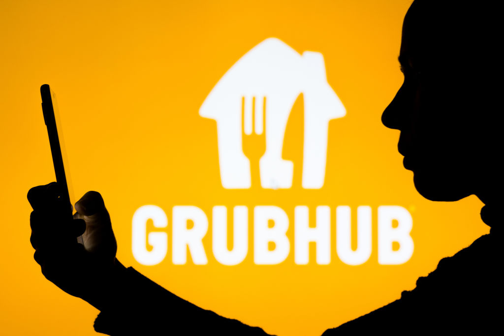 In this photo illustration the Grubhub Inc. logo seen in the...