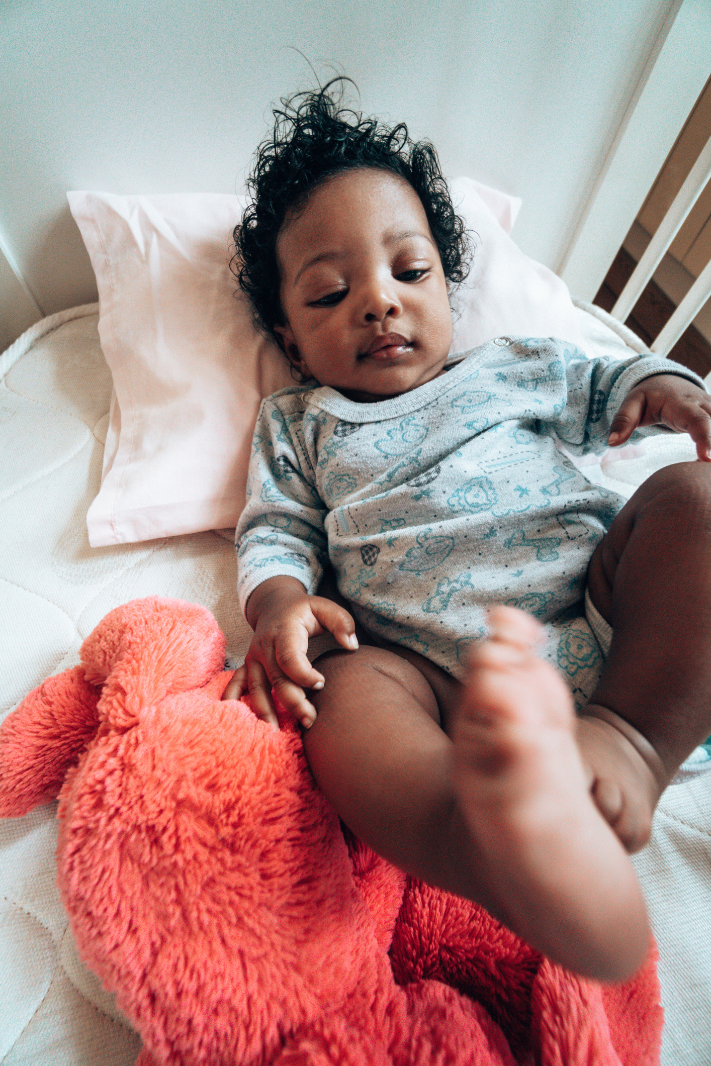 happiness african kid in the crib