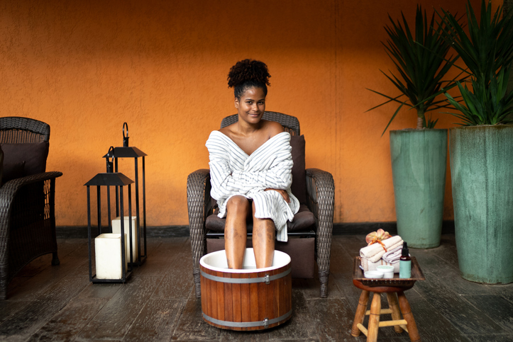 Portrait of a young woman doing a foot treatment at a spa
