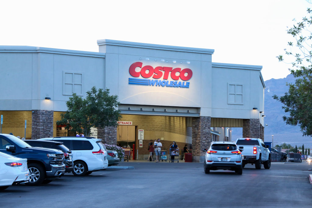 A Costco Wholesale Corporation logo is seen displayed on the...