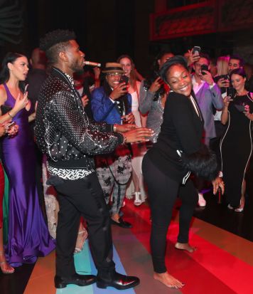 Usher and Tiffany Haddish at Kevin Hart Celebrates his 40th Birthday at TAO in Los Angeles with LOUIS XIII Cognac and Rémy Martin