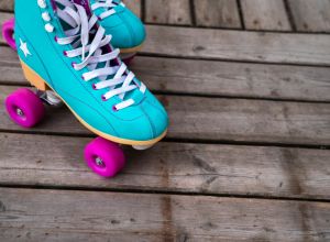 Roller skates on floorboard