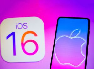 iOS 16 Logo- In this photo illustration, the Apple logo seen displayed on...