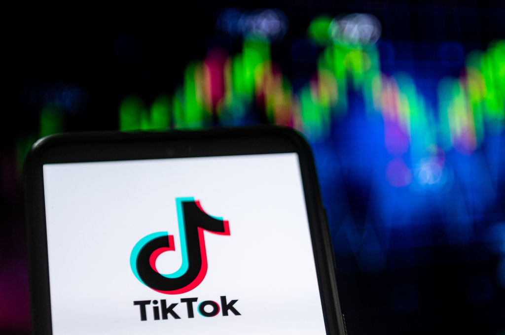 TikTok Logo - In this photo illustration a TikTok logo seen displayed on a...