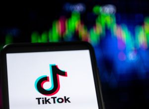 TikTok Logo - In this photo illustration a TikTok logo seen displayed on a...