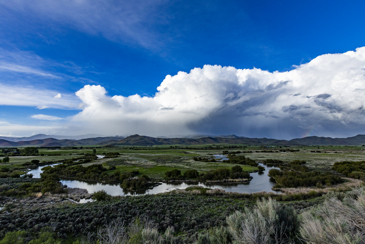 Usa, Idaho, Bellevue, White puffy clouds over landscape near Sun Valley