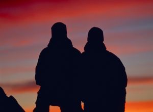 Mountain Climbers at Sunset