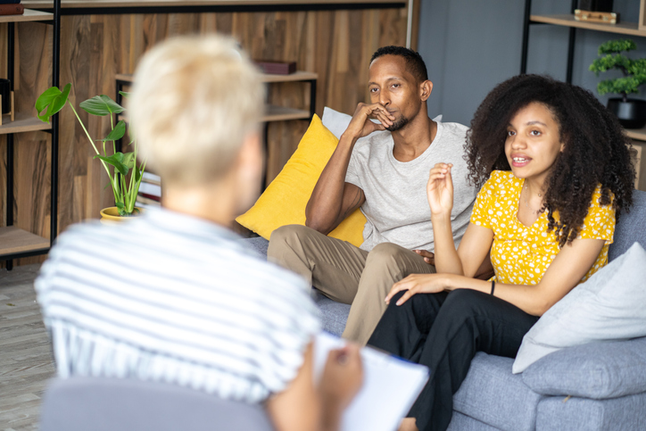 Young couple in a marriage counselling session