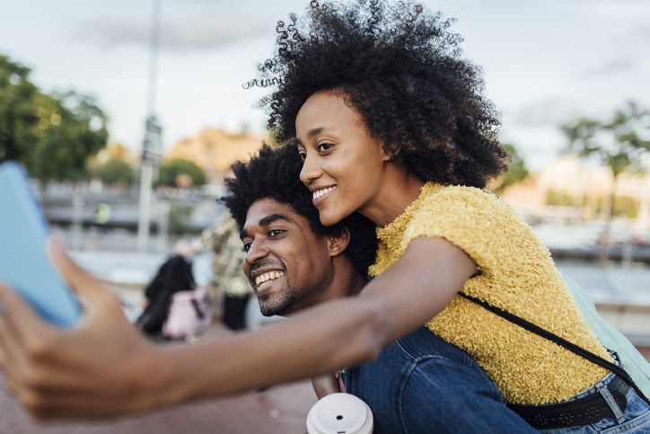 African American couple Black singles having fun in Barcelona and taking a selfie