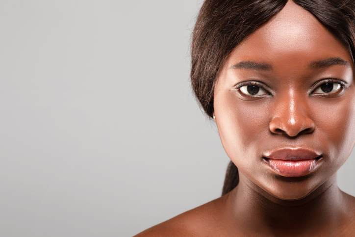 Closeup Portrait Of Beautiful Young African American Woman Looking At Camera