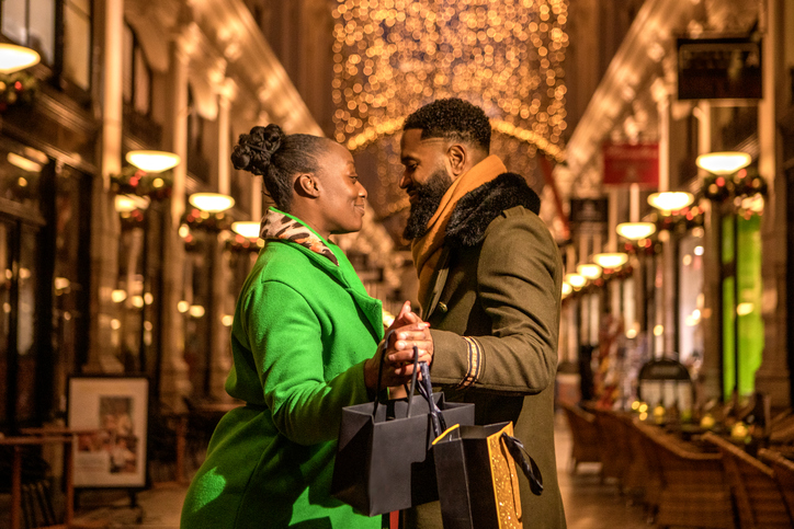 A beautiful black couple at Christmas winter shopping in the Hague
