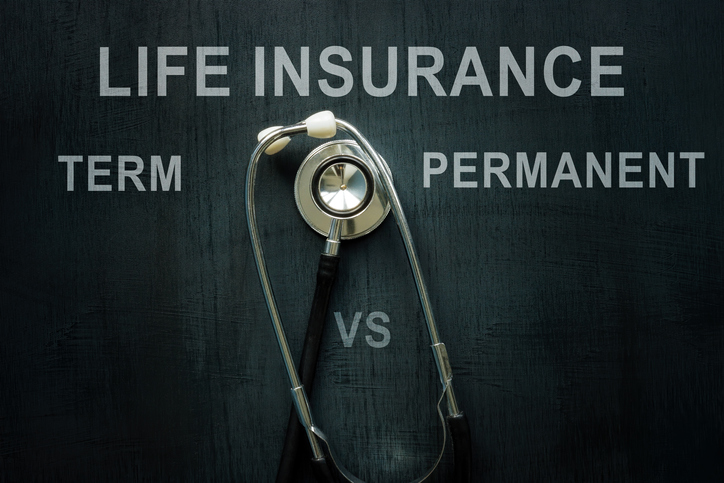 Stethoscope and words on the desk Life insurance term vs permanent.