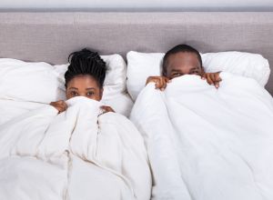 Couple Trying To Hide In Blanket avoiding a kink