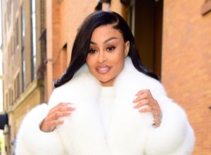 Blac Chyna celebrated Easter Sunday with a dramatic photo shoot that captured her posing in front of a giant cross.