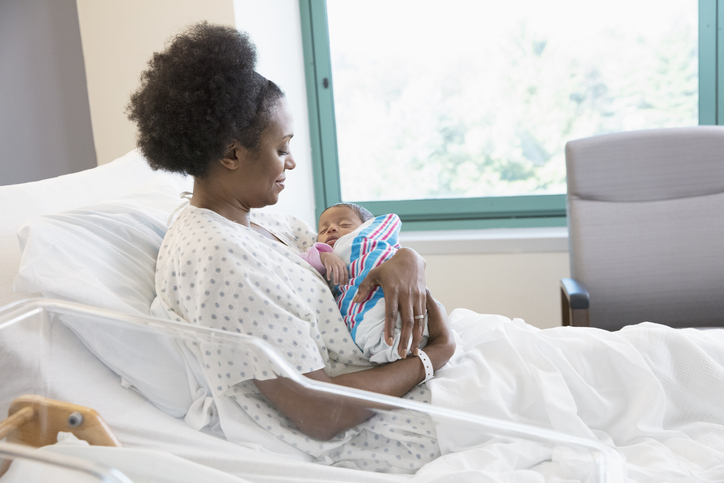Mother with newborn at hospital room