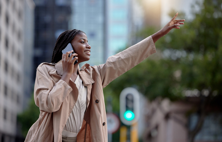 Travel, phone call and child-free black woman with hand for taxi, cab and signal transport service in New York city street. Urban commute, business and girl on smartphone for network, communication and journey