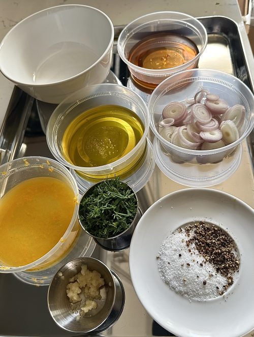 Ingredients for this Meyer Lemon Dressing Recipe: sliced ​​shallots, fresh herbs, garlic, oil, lemon juice, salt and pepper.