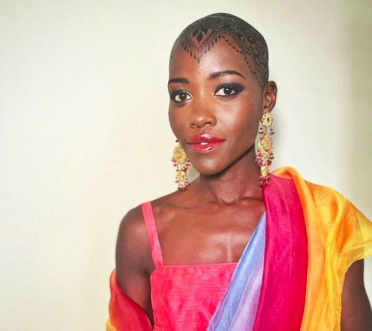 Lupita Nyong'o Covers Bald Head in Henna to Attend Friend's Musical