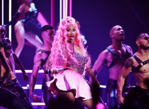 Nicki Minaj boobs breast reduction swatting call home fire abuse