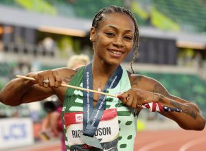 Sha'Carri Richardson orange wig race 100-meter time national title hair