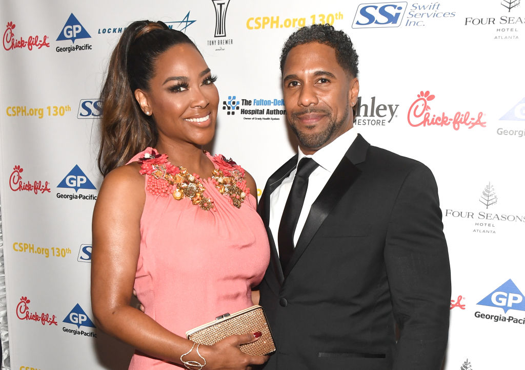 Kenya Moore Marc Daly child Brooklyn divorce contempt court RHOA