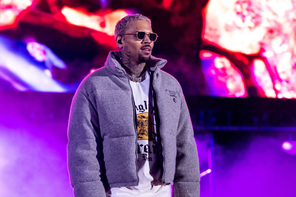 Chris Brown lawsuit City National Bank net worth chicken Popeyes