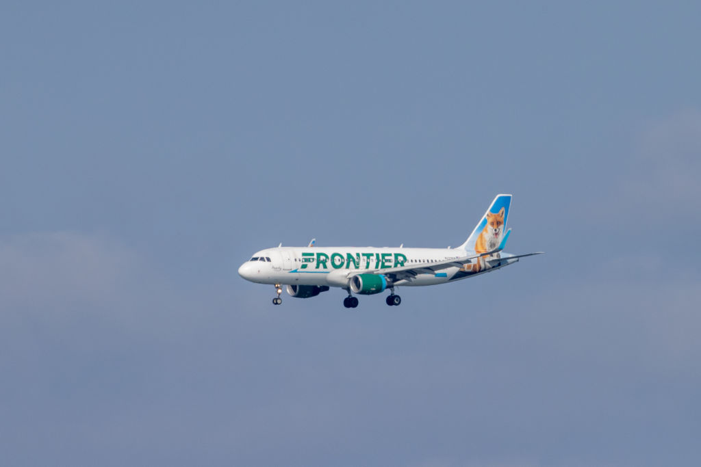 Frontier Airlines white woman Jesus meltdown Houston Denver plane flight