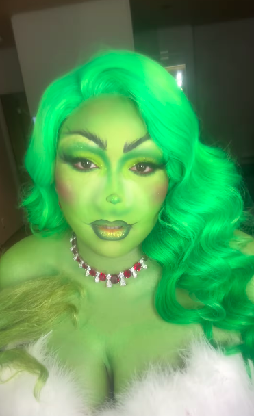 Lizzo Shows Her Holiday Spirit By Giving Us Grinch Glam