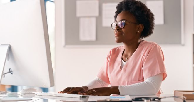 Healthcare, computer and black woman nurse in office for medical, newsletter or case study research. Hospital, Telehealth or lady pediatric specialist online for patient, consulting or digital script