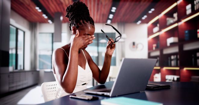 Depressed Sad Young Girl With Headache Sitting At Home