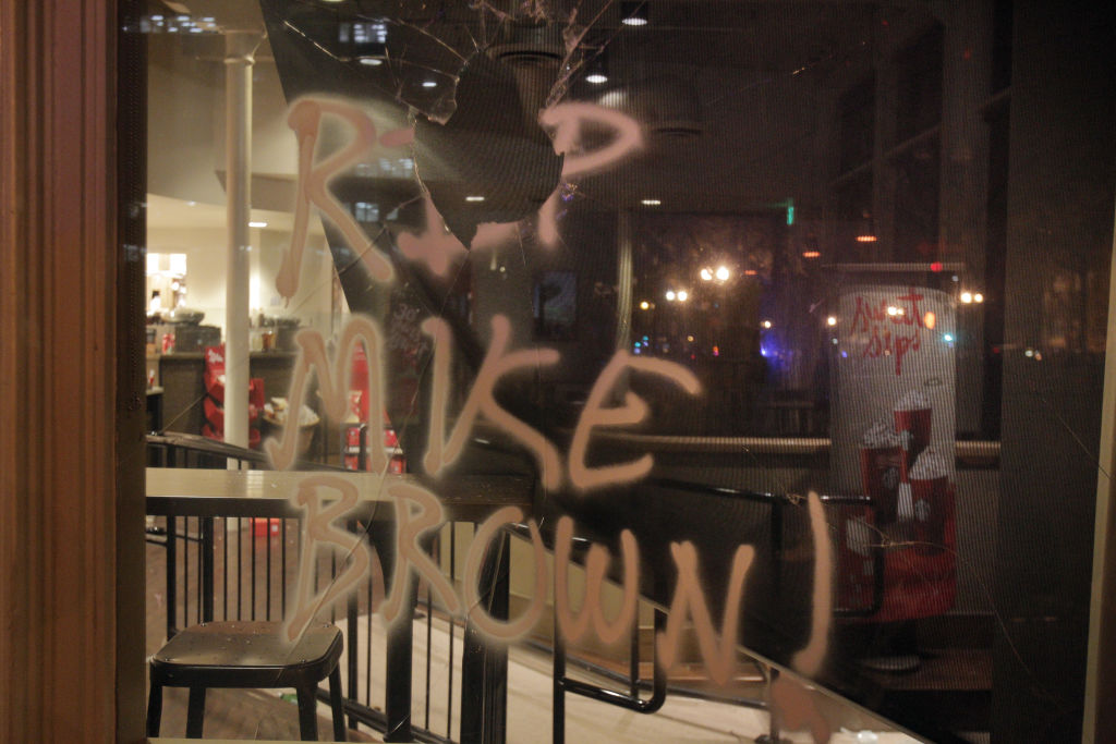 The vandalized window of a Starbucks on Broadway and 8th Street in Oakland, Calif., on Monday, November 24, 2014 during a protest following the announcement of no indictment against the officer who shot and killed Michael Brown in Ferguson, Missouri